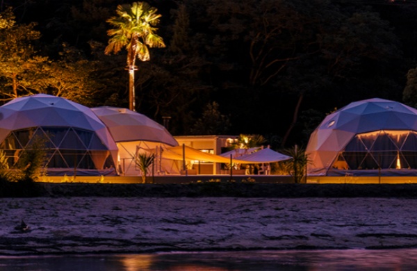 Why is the Starry Dome Tent Hotel so popular in recent years?